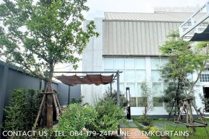 ภาพภายนอกอาคารสำนักงาน A PLUS Associate ย่านลำลูกกา ที่ติดตั้งม่านปรับแสงและม่านม้วน