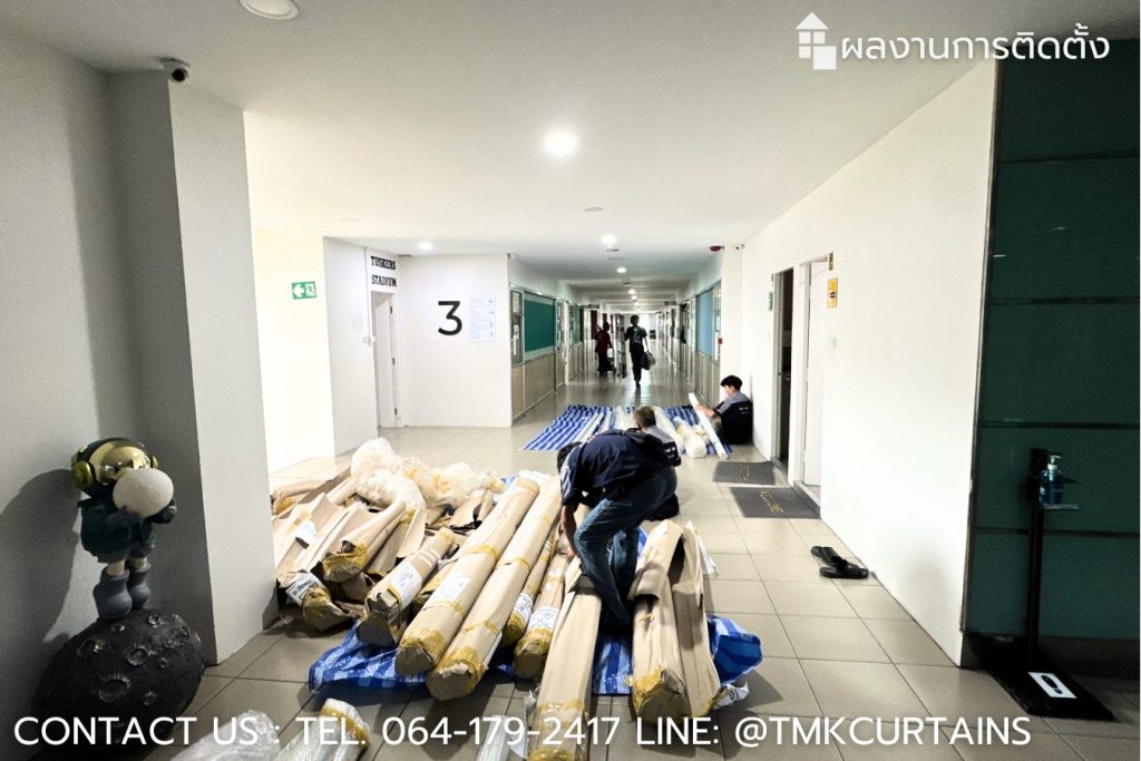 Preparing to install new blackout roller blinds during school break at KPIS - ทีมช่างเตรียมความพร้อมติดตั้งม่านม้วนจำนวนมากในช่วงปิดเทอม